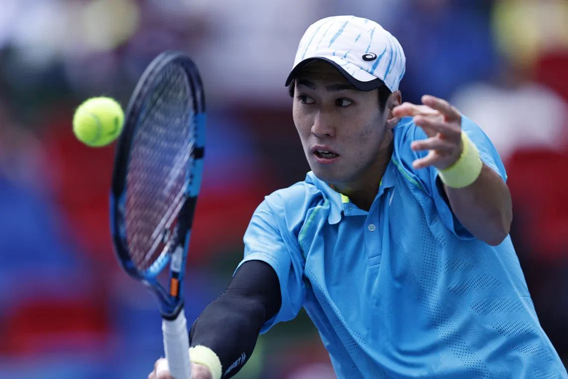 Tennis - Shanghai Masters - Qizhong Forest Sports City Arena, Shanghai, China - October 8, 2024 Japan's Yosuke Watanuki in action during his round of 32 match against Taylor Fritz of the U.S. REUTERS/Tingshu Wang
