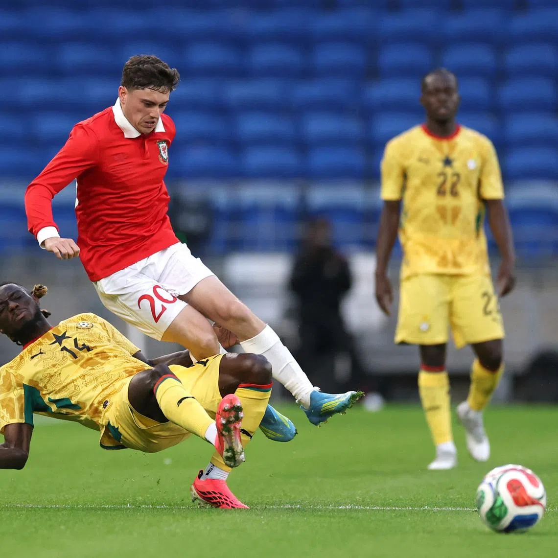Soccer Football - International Friendly - Wales v Ghana - Cardiff City Stadium, Cardiff, Wales, Britain - June 2, 2026 Wales' Daniel James in action with Ghana's Gideon Mensah Action Images via Reuters/Paul Childs