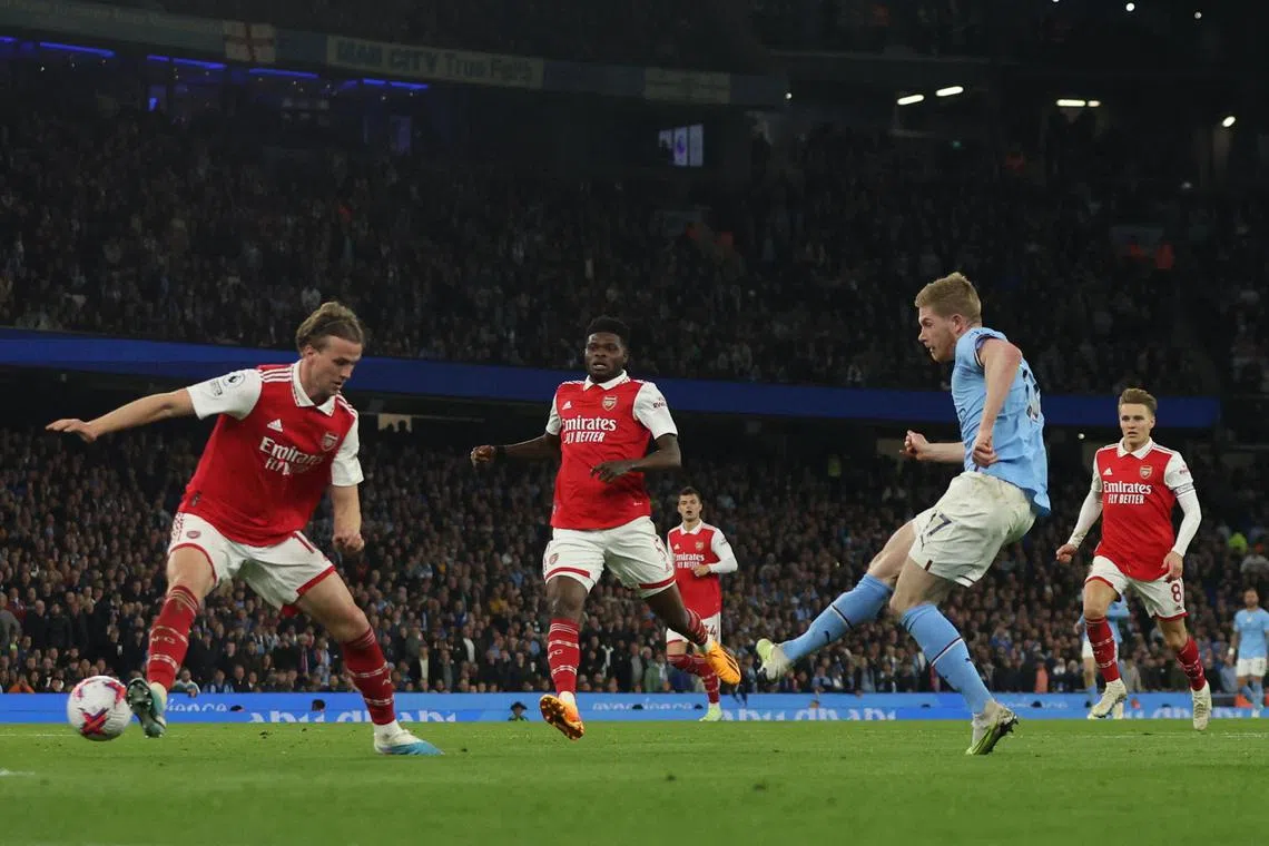 Manchester City's Kevin De Bruyne scoring their third goal against Arsenal at the Etihad Stadium on Wednesday