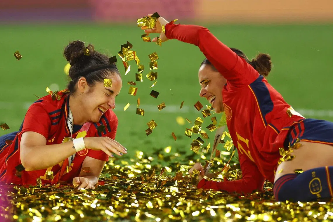 Spain's Oihane Hernandez and Claudia Zornoza celebrate after winning the FIFAWorld Cup on August 20. 2023