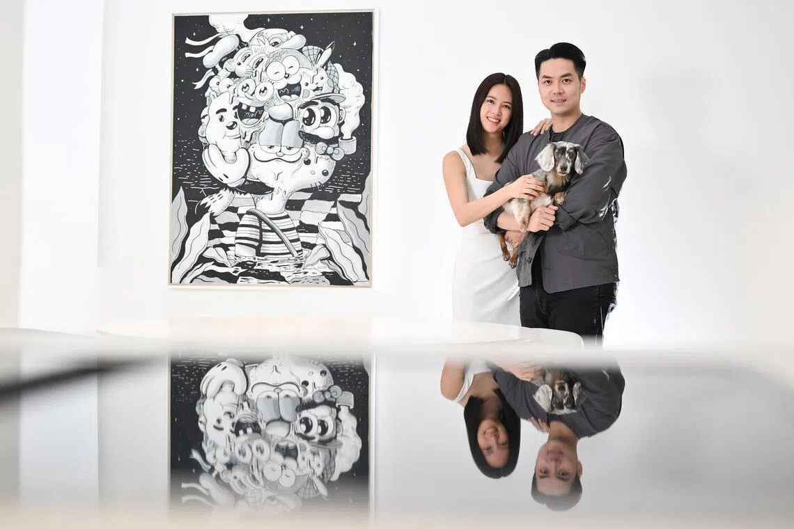 Actress Tay Ying and her celebrity chef husband Wu Sihan with Tron, their six-year-old merle dachshund at home on May 7, 2026.