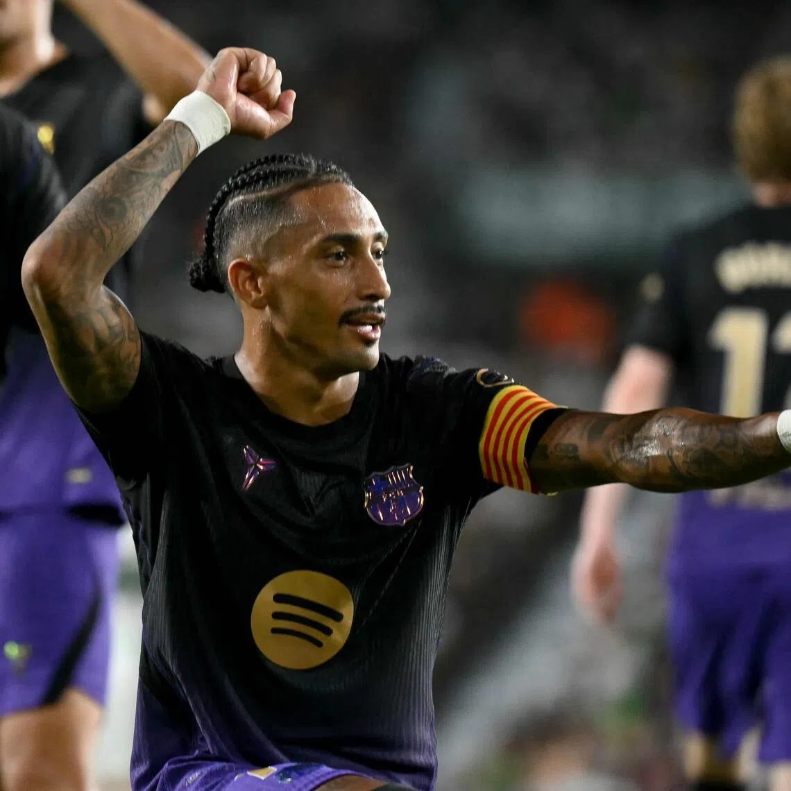 Barcelona’s Brazilian forward Raphinha celebrates scoring his team’s third goal against Elche on Aug 23.