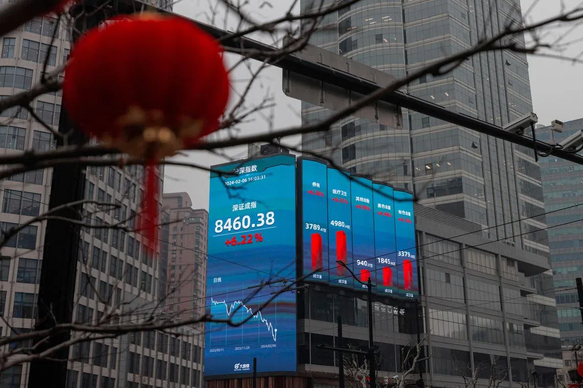 A large screen shows the latest stock exchange data in Shanghai on Feb 6, 2024.