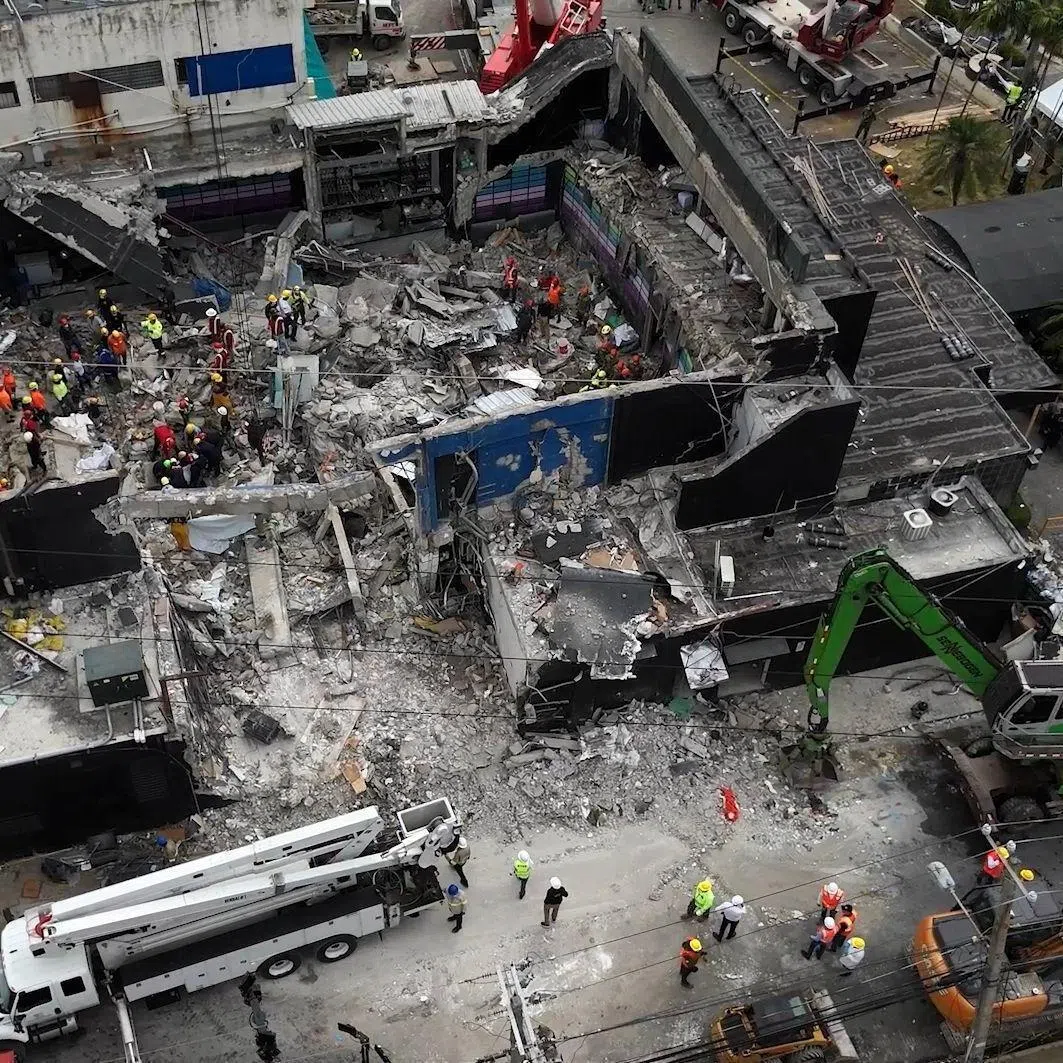An aerial view shows rescue teams working at the Jet Set nightclub a day after the collapse of its roof in Santo Domingo on April 9. 