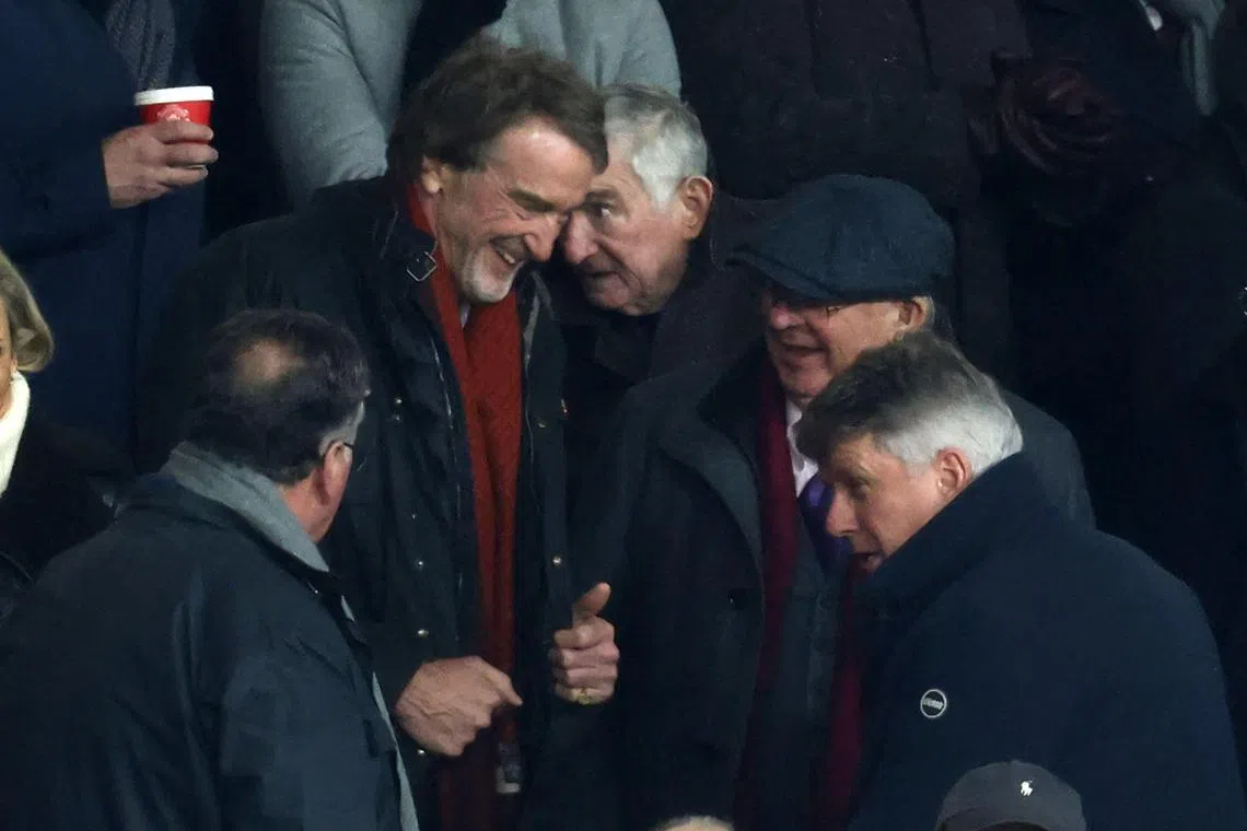 Manchester United's prospective part-owner Jim Ratcliffe taking his seat beside former manager Alex Ferguson (in cap) for the English Premier League match against Tottenham Hotspur at Old Trafford on Jan 14.
