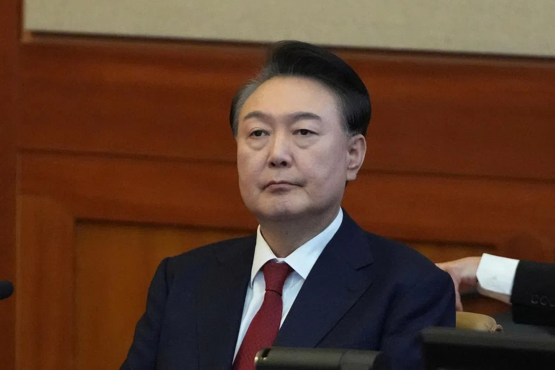 South Korea's impeached President Yoon Suk Yeol attends a hearing of his impeachment trial at the Constitutional Court in Seoul, South Korea, Tuesday, Feb. 11, 2025.     Lee Jin-man/Pool via REUTERS/ File Photo