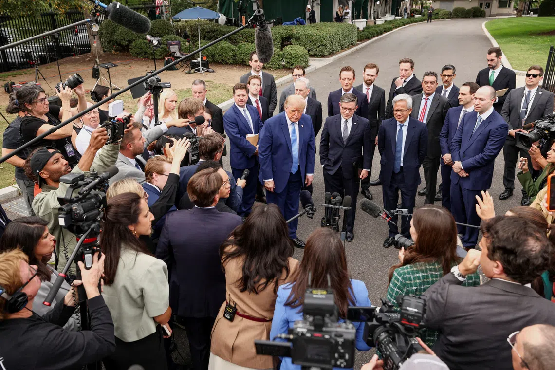 US President Donald Trump speaks to members of the media following a meeting with tech executives on artificial intelligence at the White House, on Sept 29.