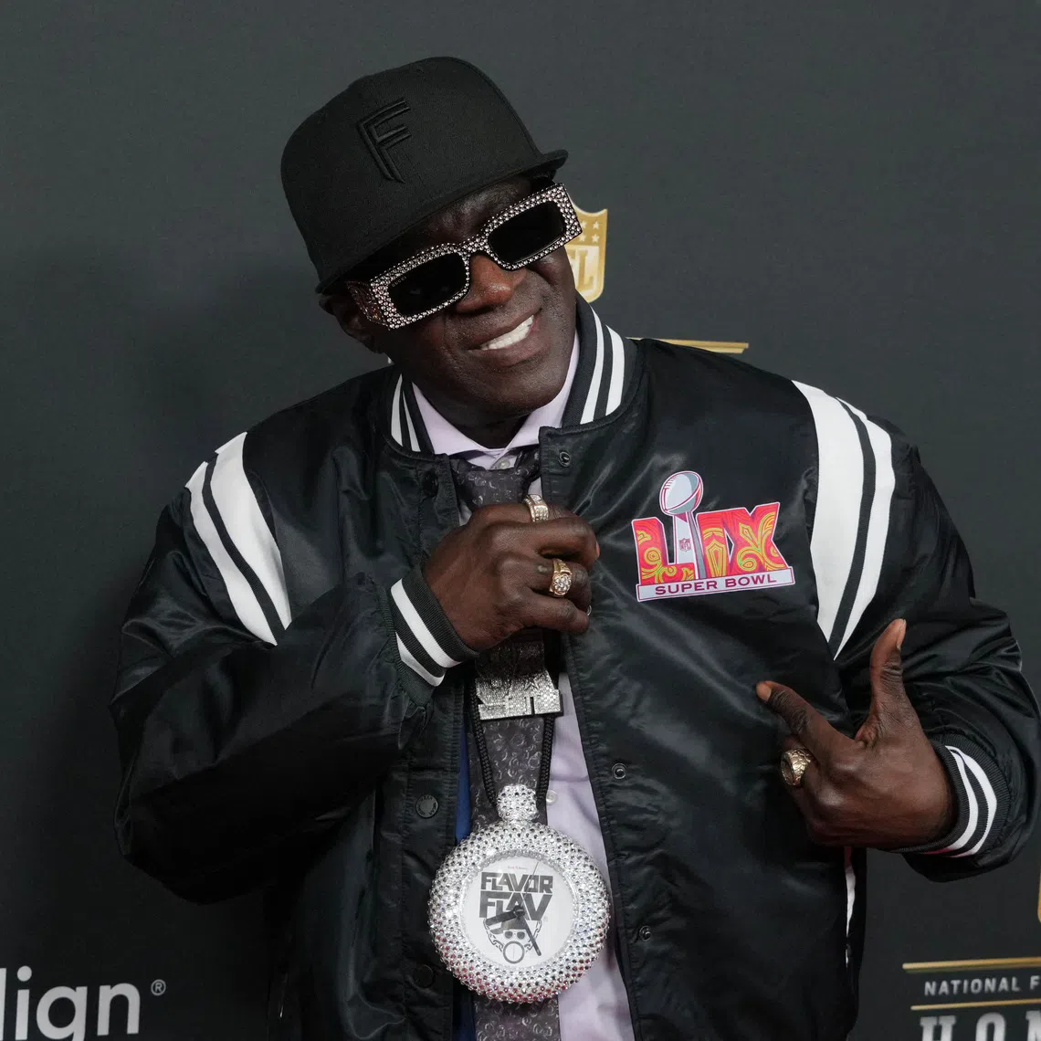 Feb 6, 2025; New Orleans, LA, USA; Flavor Flav on the red carpet before Super Bowl LIX NFL Honors at Saenger Theatre. Mandatory Credit: Kirby Lee-Imagn Images