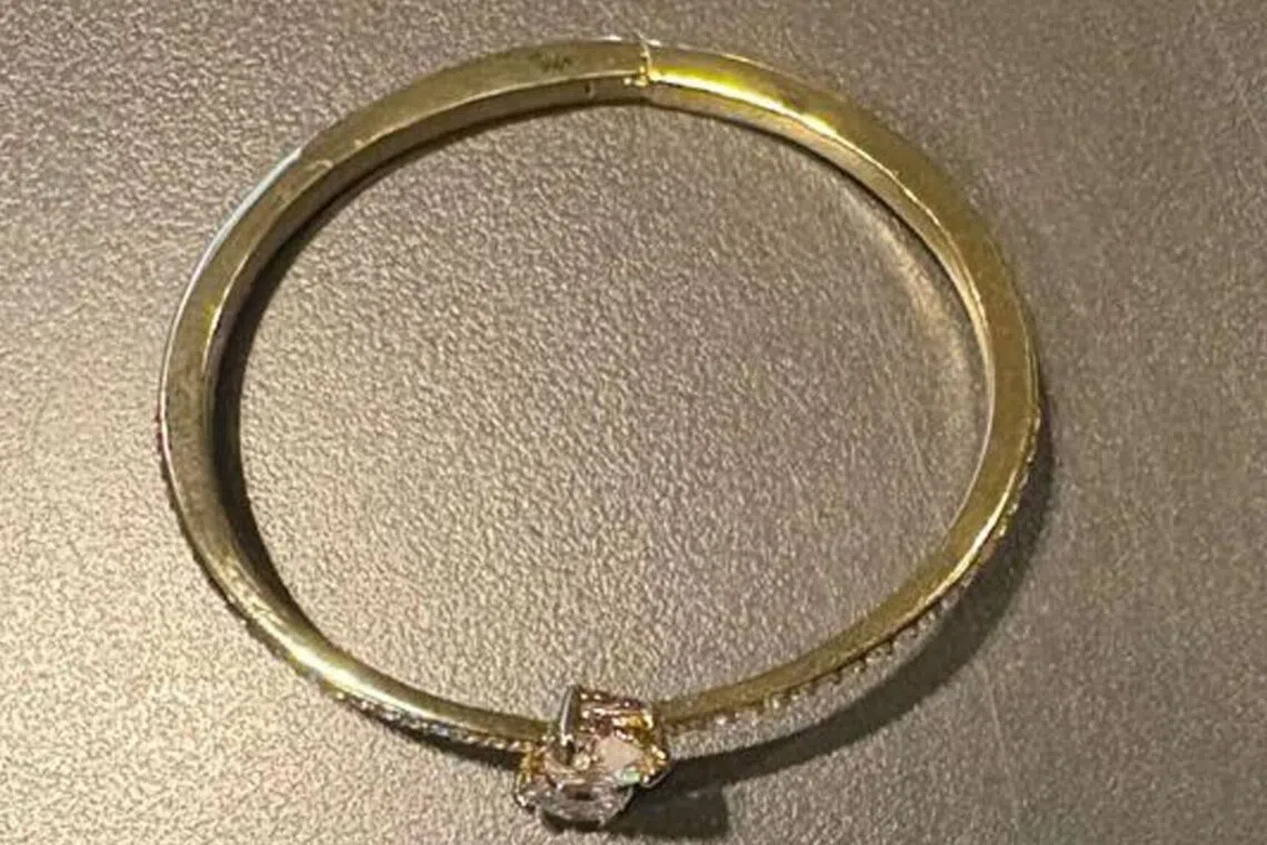 The stolen Swarovski bracelet from the Changi Airport store was worth $255.95.