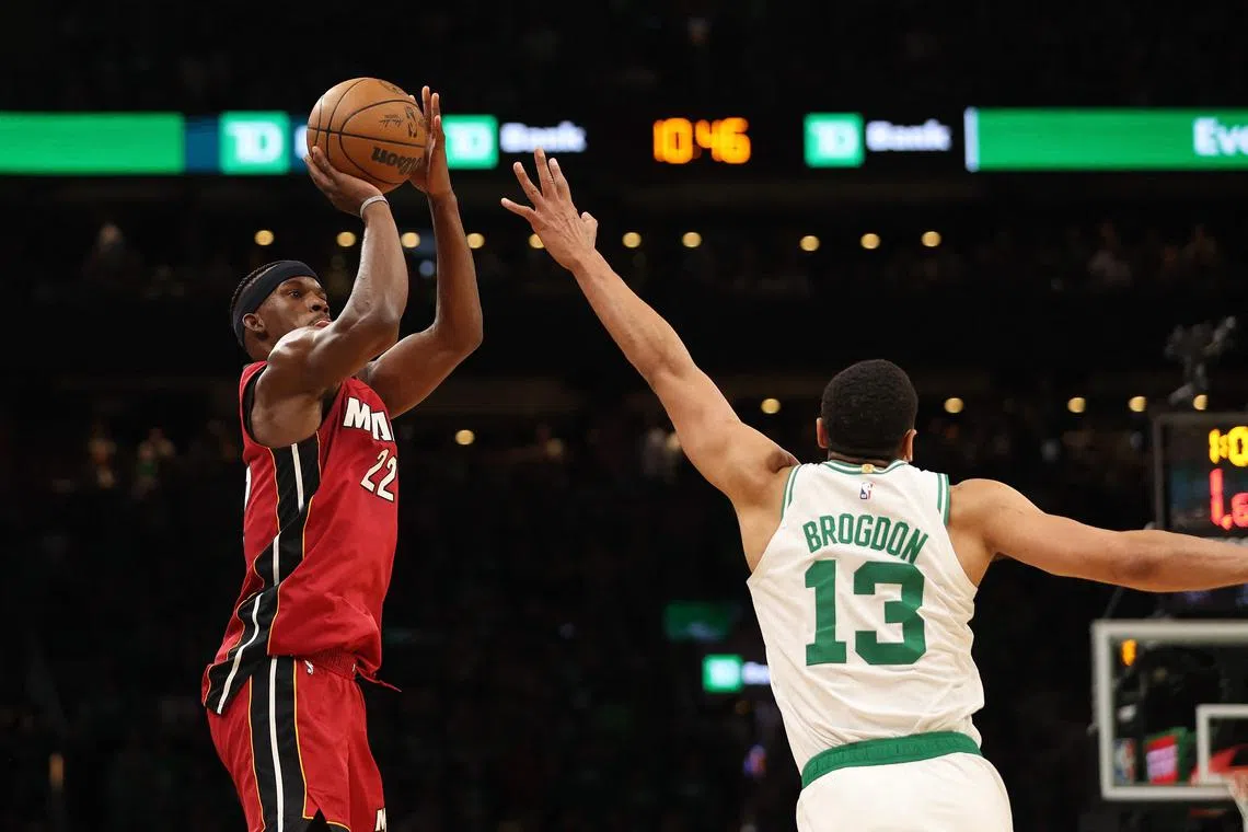 Miami Heat's Jimmy Butler shoots over Boston Celtics' Malcolm Brogdon during the fourth quarter at TD Garden on May 17.