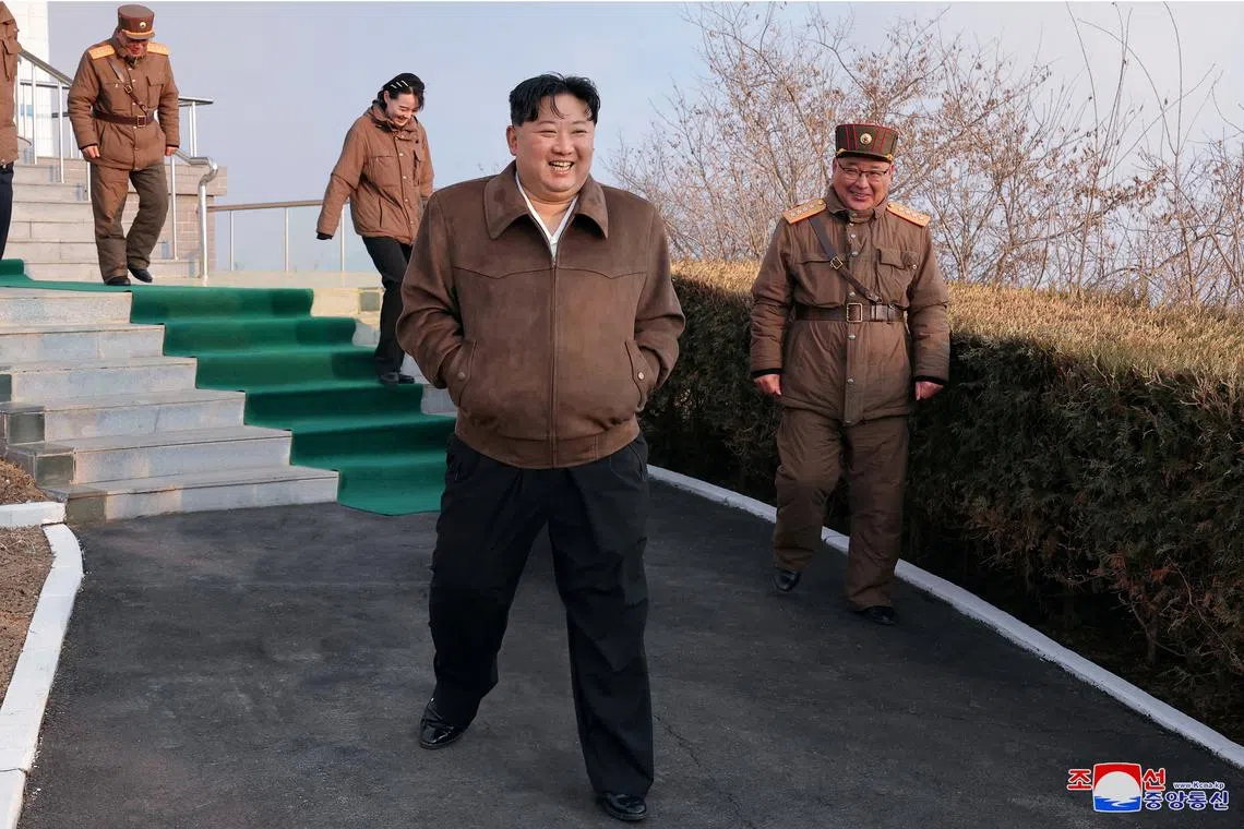 FILE PHOTO: North Korean leader Kim Jong-un attends a ground test of a solid-fuel engine for a new type of intermediate-range hypersonic missile as part of a program of developing national defense capability, at an unknown location in North Korea, March 19, 2024. KCNA via REUTERS /File Photo