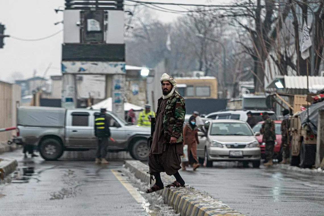 Taliban security force blocking a road after a suicide blast near Afghanistan's foreign ministry in Kabul on Jan 11, 2023.