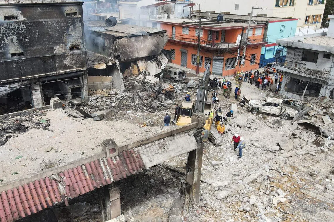The blast shook the commercial area of San Cristobal, sparking a fire that burned for hours, and a huge column of smoke.