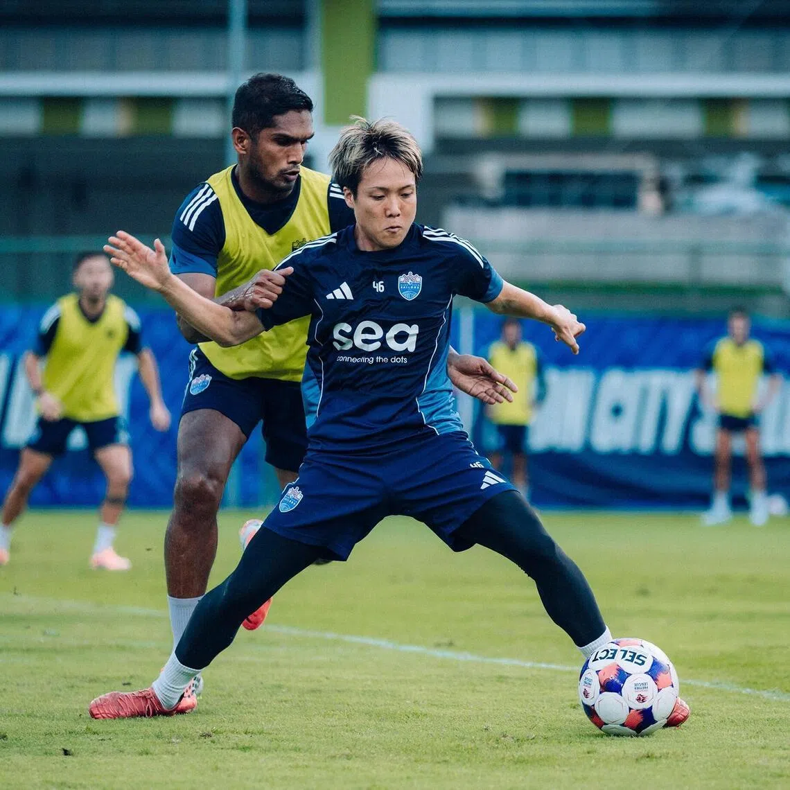 Kyoga Nakamura shield the ball from captain Hariss Harun in training on April 29, as the Lion City Sailors prepare for a big clash with BG Tampines Rovers. 
Credit: Lion City Sailors