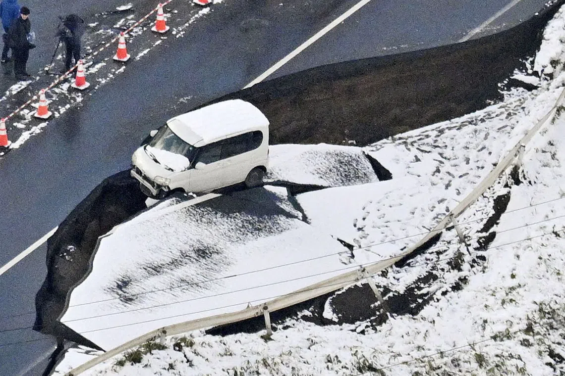 A collapsed road in Tohoku in Aomori Prefecture, northeastern Japan, on Dec 9, 2025, following a strong earthquake that struck the region.