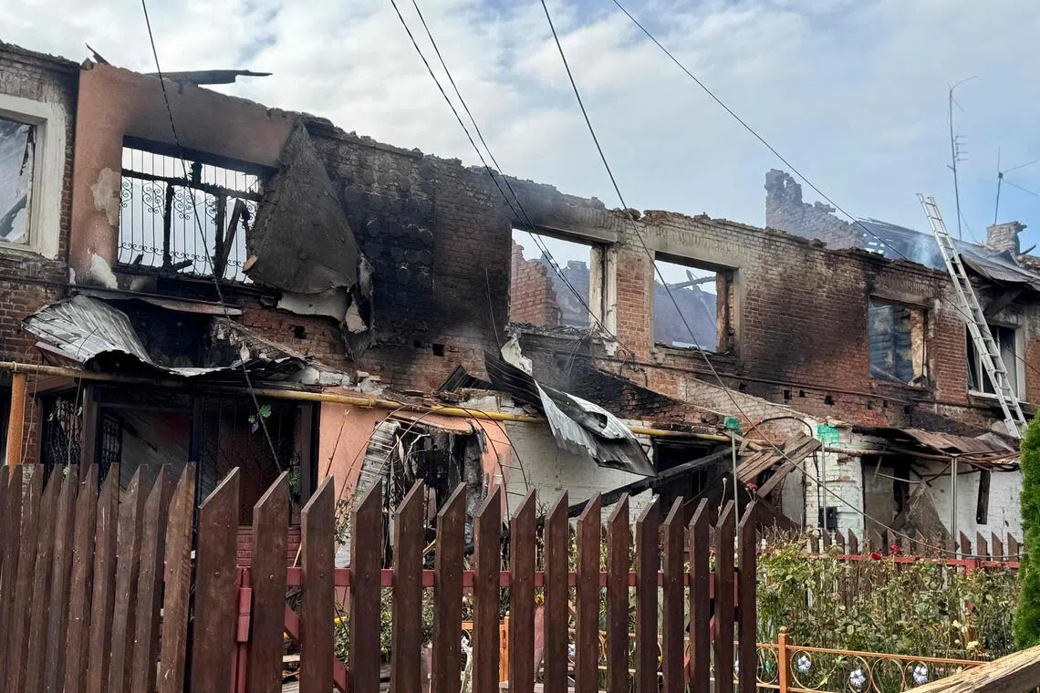 A damaged residential building following a Russian drone attack in Ukraine's Sumy region, which borders Russia.