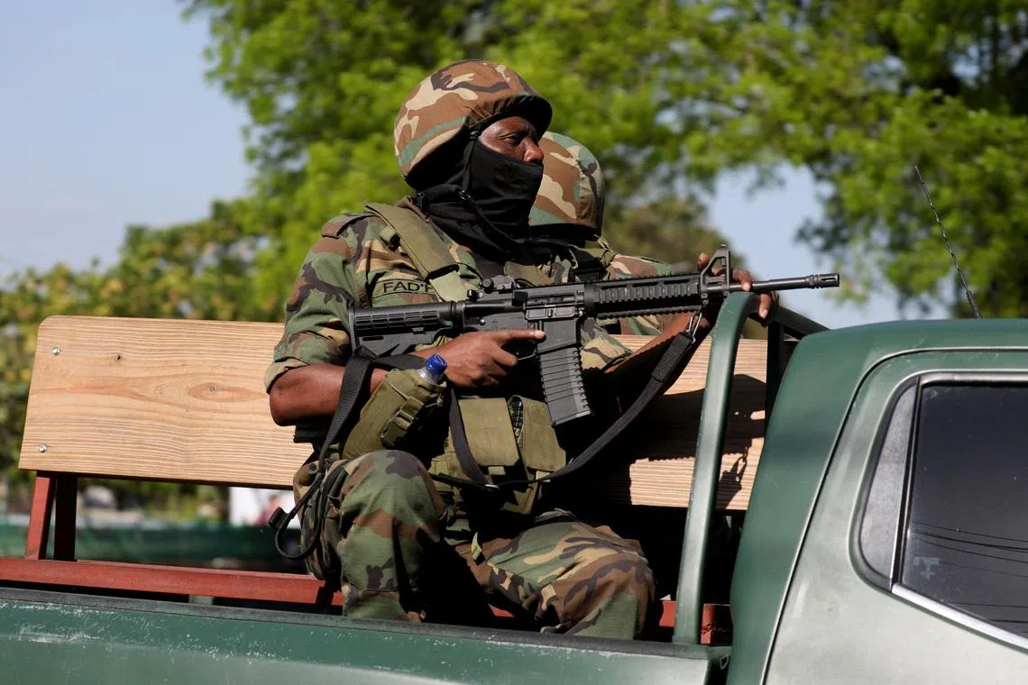 FILE PHOTO: Law enforcement officers patrol amid ongoing gang violence, in this file photo from Haiti, March 19, 2025. REUTERS/Ralph Tedy Erol/File Photo