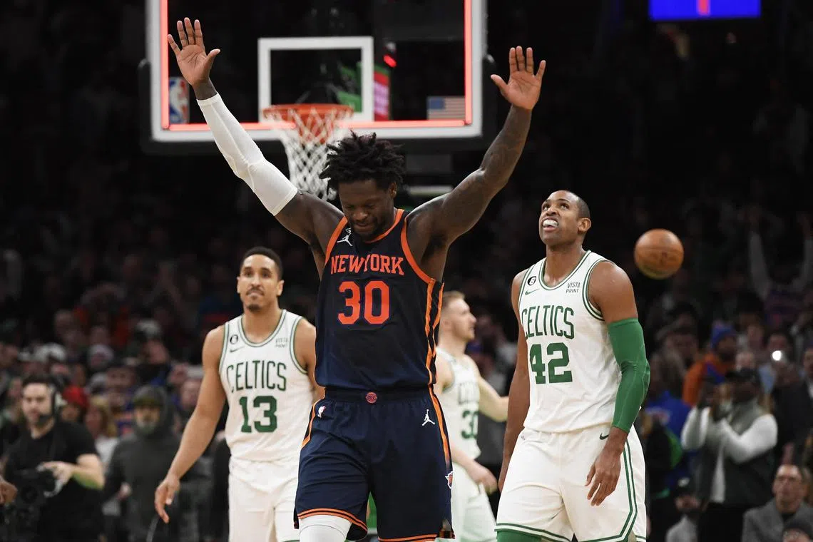 New York Knicks forward Julius Randle (30) reacts after defeating the Boston Celtics.