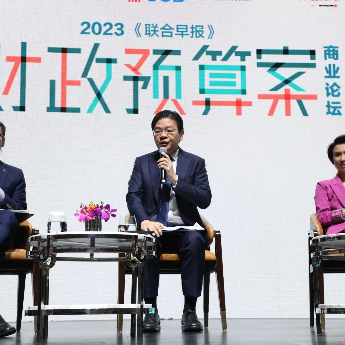(From left) Forum moderator and Lianhe Zaobao editor Goh Sin Teck, Deputy Prime Minister Lawrence Wong and Minister of State for Trade and Industry Low Yen Ling.