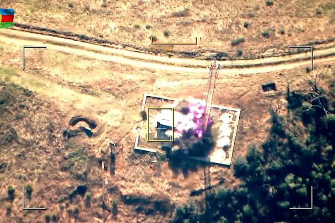 A still image from video, published by Azerbaijan's Ministry of Defence, shows what it said to be an attack and neutralization of the military radio-technical node of the units of the armed forces of Armenia in the region of Nagorno-Karabakh, in this image taken from video published September 19, 2023. Azerbaijan's Ministry of Defence/Handout via REUTERS