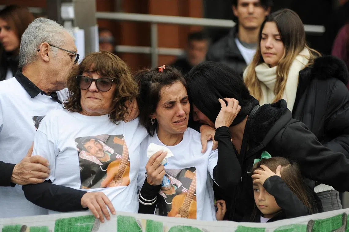 Relatives of patients who died after being treated with contaminated fentanyl protesting outside the Hospital Italiano in Buenos Aires on July 31.