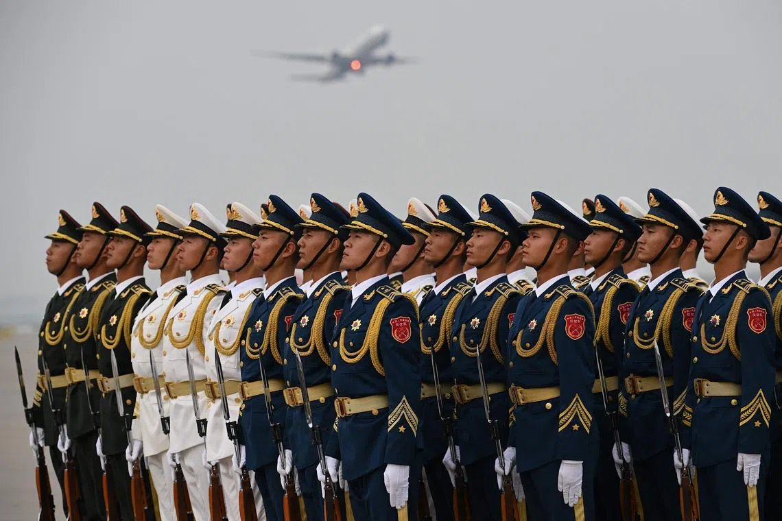 Chinese honour guards prepareing for the arrival of Turkmenistan's delegation ahead of the Belt and Road Forum at the airport in Beijing on October 17, 2023. 
