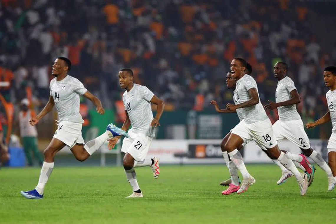 FILE PHOTO: Soccer Football - Africa Cup of Nations - Quarter Final - Cape Verde v South Africa -  Stade Charles Konan Banny, Yamoussoukro, Ivory Coast - February 3, 2024 South Africa players celebrate after winning the penalty shootout REUTERS/Siphiwe Sibeko/File Photo