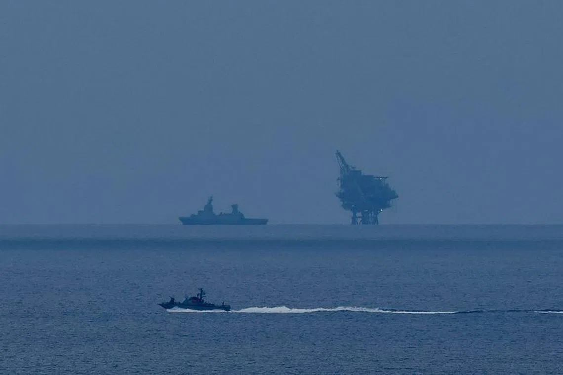 An Israeli military ship sails in the Mediterranean Sea, amid the ongoing conflict between Israel and the Palestinian Islamist group Hamas, as seen from Southern Israel, December 17, 2023. REUTERS/Clodagh Kilcoyne