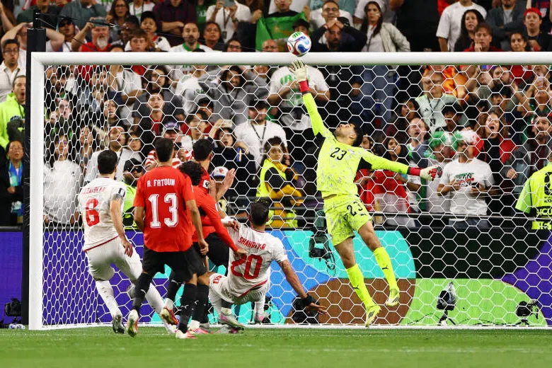 Egypt’s Mostafa Shoubir in action with Iran‘s Shahriyar Moghanloo and Saeid Ezatolahi on June 26.