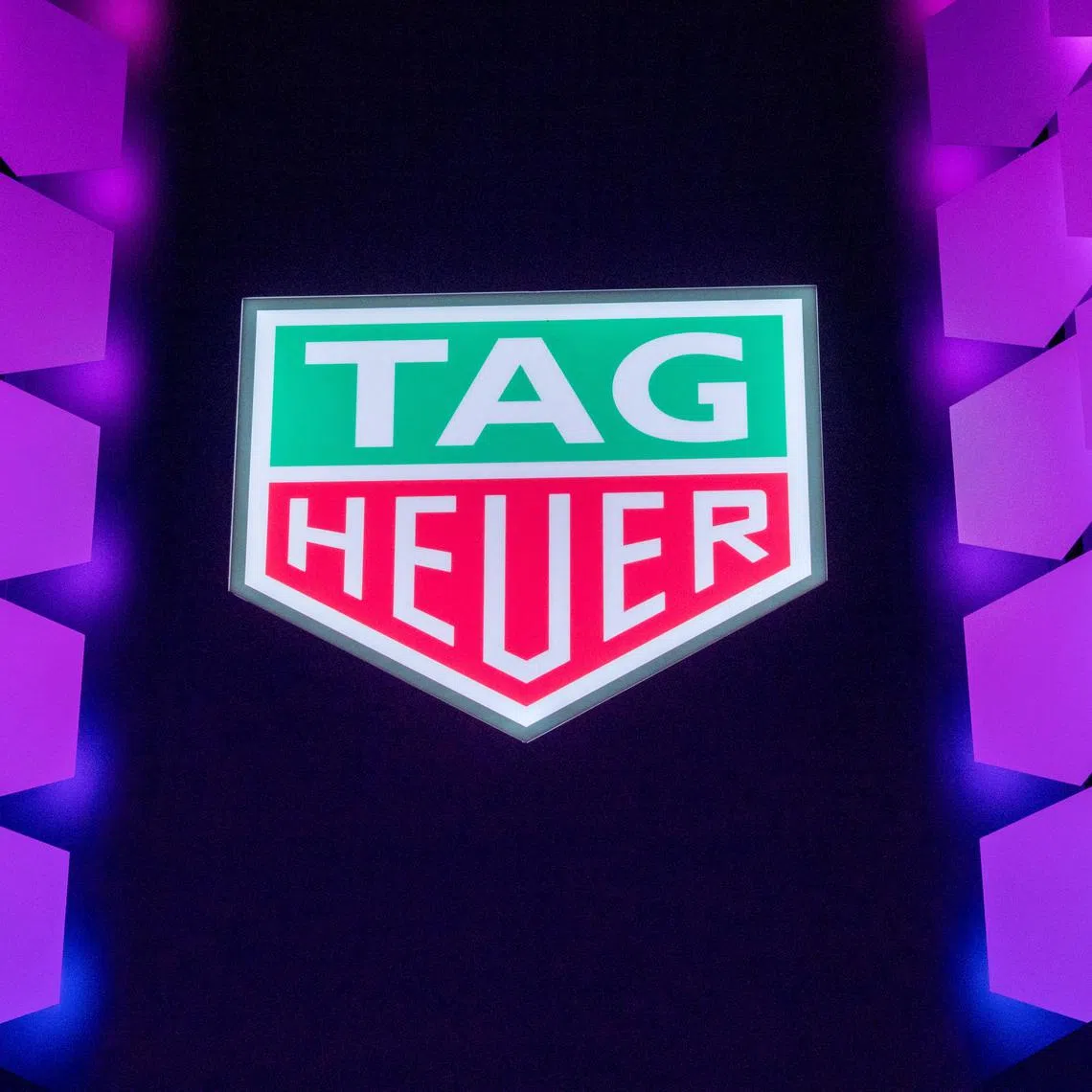 FILE PHOTO: A logo of Tag Heuer, art of LVMH, is seen during the Watches and Wonders fair in Geneva, Switzerland March 27, 2023. REUTERS/Denis Balibouse/ File Photo