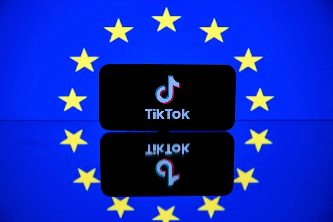 (FILES) This picture taken on April 26, 2023 in Toulouse, southwestern France, shows a screen displaying the Tiktok social media platform's logo and the European flag. A European Union regulator fined Chinese-owned social media platform TikTok 345 million euros ($369 million) over child data breaches on September 15, 2023. Ireland's Data Protection Commission, which plays a central role in enforcing EU data rules, gave TikTok three months to make the appropriate changes. (Photo by Lionel BONAVENTURE / AFP)