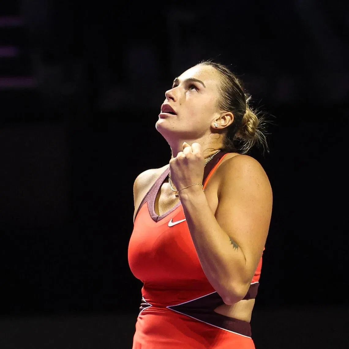 Aryna Sabalenka celebrates winning her semi-final match against Amanda Anisimova of the US.