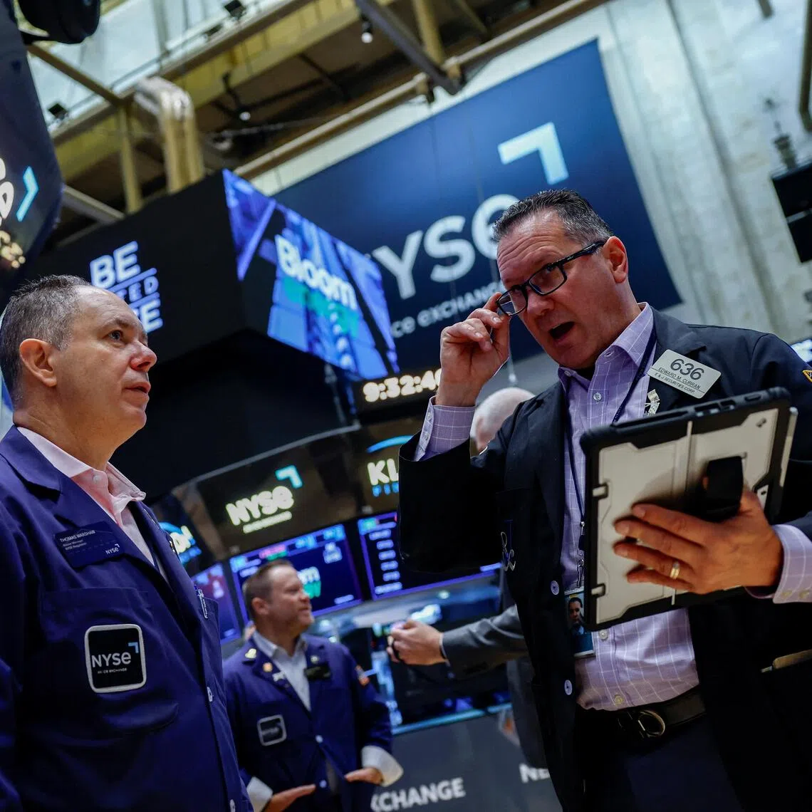Traders working on the floor of the New York Stock Exchange, in New York City, on Sept 29.