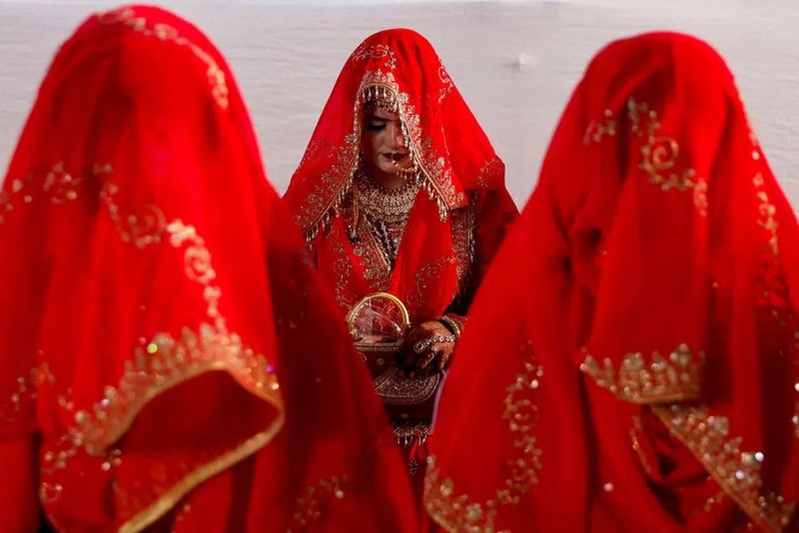 FILE PHOTO: Muslim women are seen during a mass marriage ceremony, in which, 51 Muslim couples took their wedding vows, in Mumbai, India, January 14, 2024. REUTERS/Francis Mascarenhas/File Photo