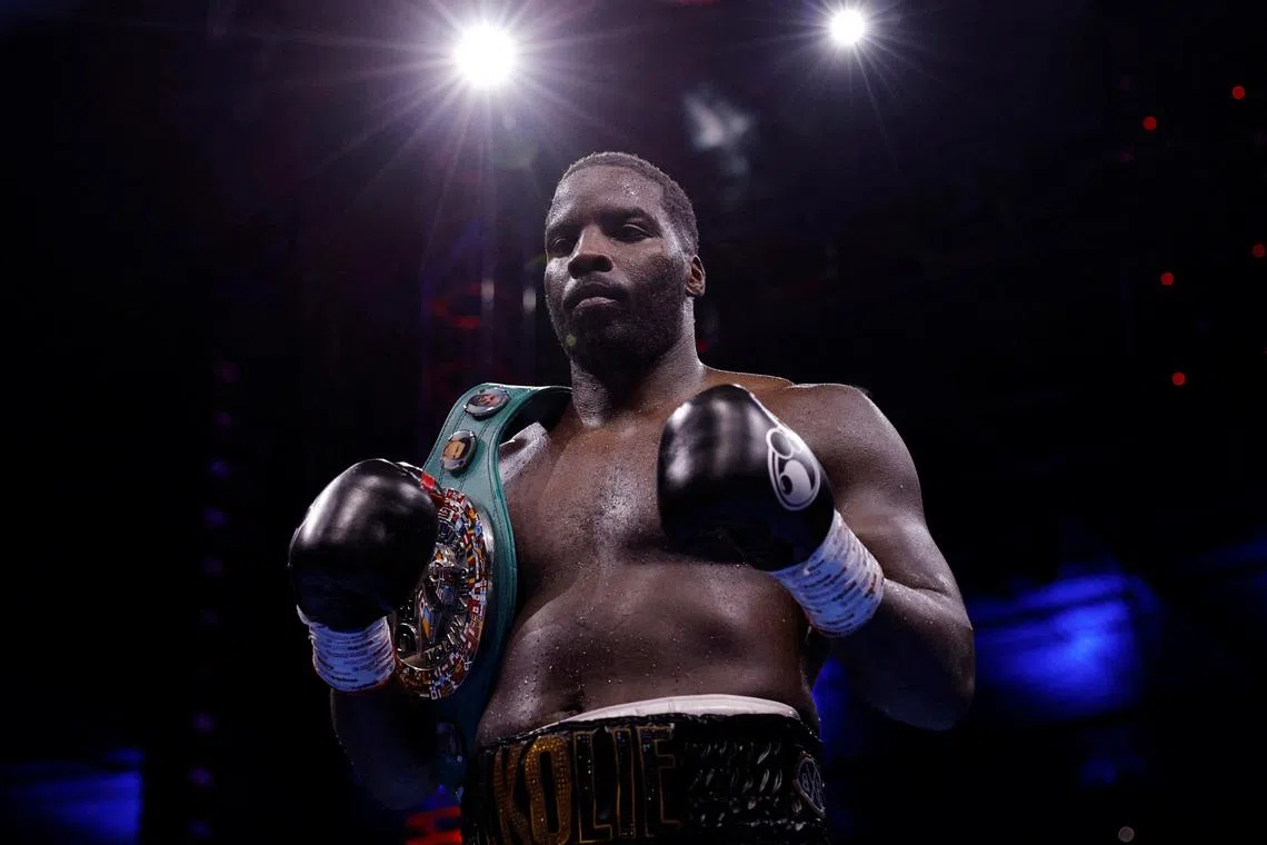 FILE PHOTO: Boxing - Lawrence Okolie v Kevin Lerena - WBC silver heavyweight title - Wembley Stadium, London, Britain - July 19, 2025 Lawrence Okolie poses with the belt after winning his fight against Kevin Lerena Action Images via Reuters/Andrew Couldridge/File Photo