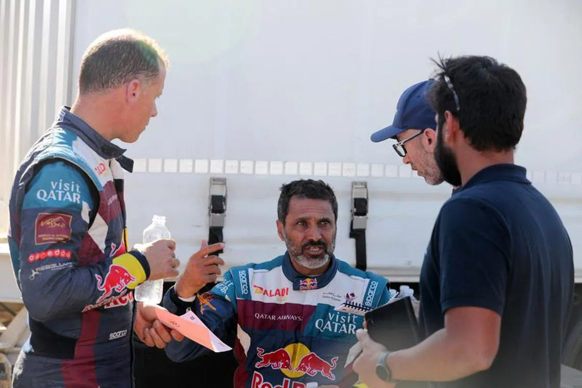 Rallying - Dakar Rally - Stage 3 - Al Duwadimi to Al Salamiya - Saudi Arabia - January 8, 2023  Nasser Racing's Nasser Al-Attiyah and Mathieu Baumel after stage 3 REUTERS/Hamad I Mohammed/File Photo
