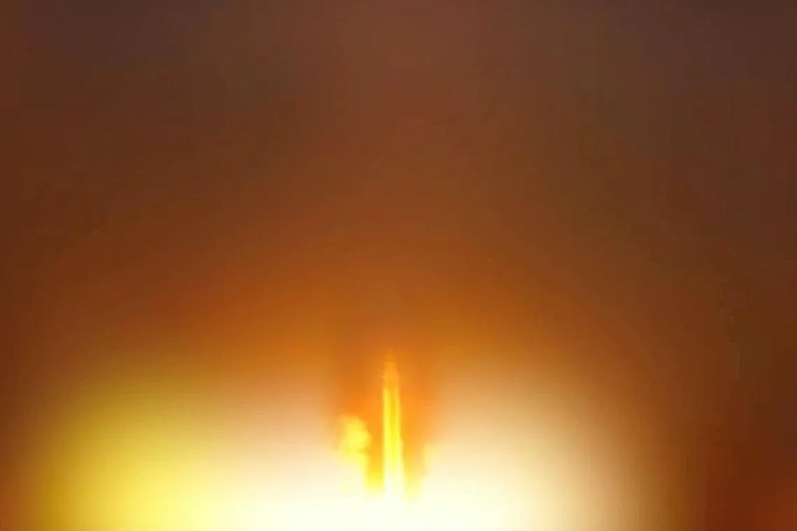 An Iranian missile is launched, as Iran's Revolutionary Guards said they had carried out attacks against a U.S. base in Jordan and 21 other targets in the Gulf on Wednesday in retaliation for American strikes around the Strait of Hormuz, from a location given as Tehran, Iran, released June 10, 2026, in this still image taken from a video.  WANA via Pool/via REUTERS