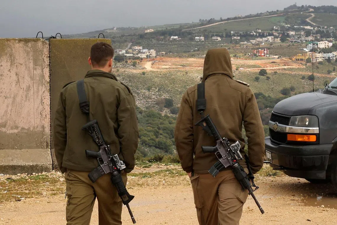Israeli soldiers patrol along the border with Lebanon, on March 15, 2023.