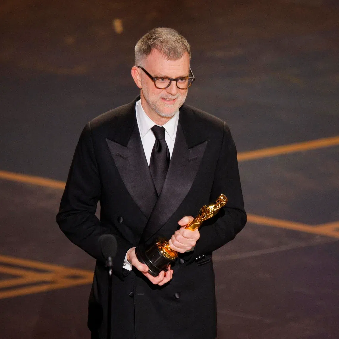 Paul Thomas Anderson accepts the award for Best Director for Best Director onstage during the 98th Annual Academy Awards on March 15.
