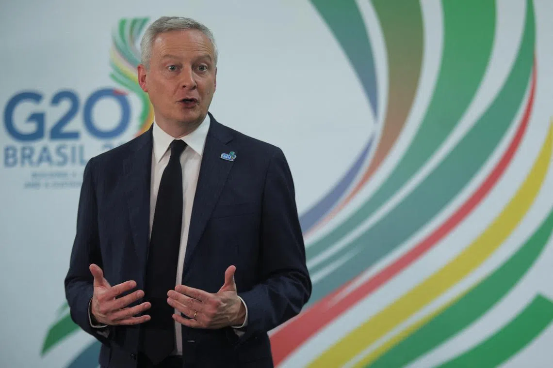 France's Minister of Economy and Finance Bruno Le Maire talks to the press during the G20 Finance Ministers and Central Banks Governors meeting, in Sao Paulo, Brazil, February 28, 2024. REUTERS/Carla Carniel/File Photo