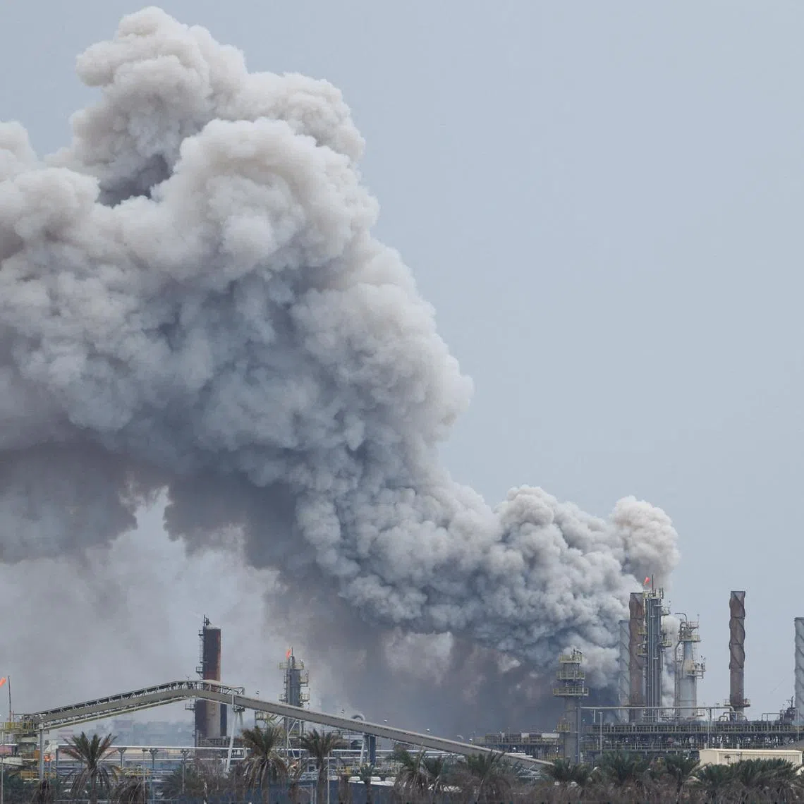Smoke rises following a strike on the Bapco Oil Refinery, amid the U.S.-Israeli conflict with Iran, on Sitra Island Bahrain, March 9, 2026. REUTERS/Stringer