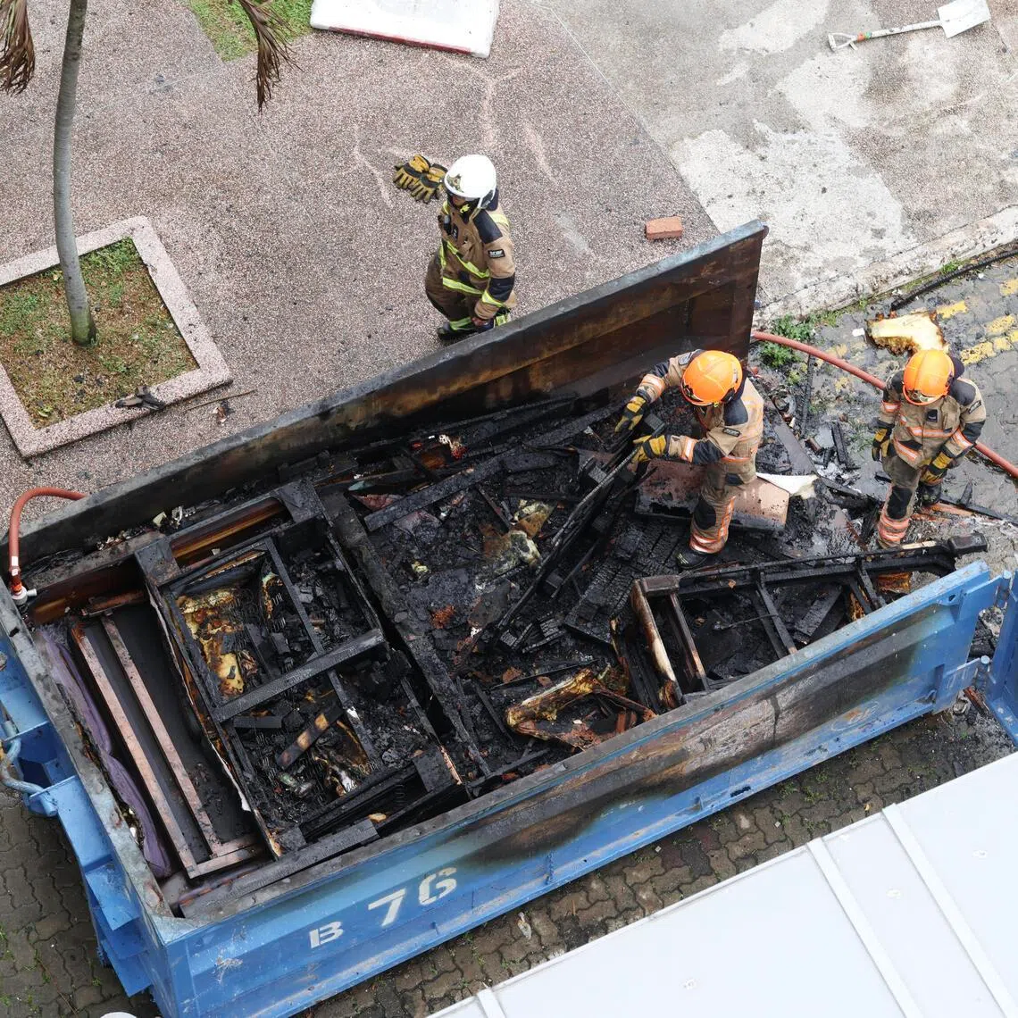 The fire is believed to have been sparked by a cigarette butt that someone hda thrown into the skip bin, reported Lianhe Zaobao.
