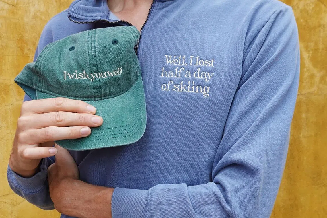 Embroidered hats and sweatshirts by Chantal Strasburger feature quotes from American actress Gwyneth Paltrow's ski crash trial. 