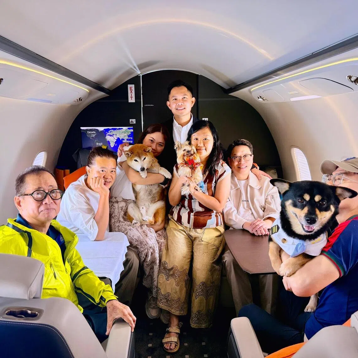 ssjet - Founder of SingaPawAir Jamie Wong on a flight with Mr Peter Chen and his friends in May 2026. 
Credit: SingaPawAir