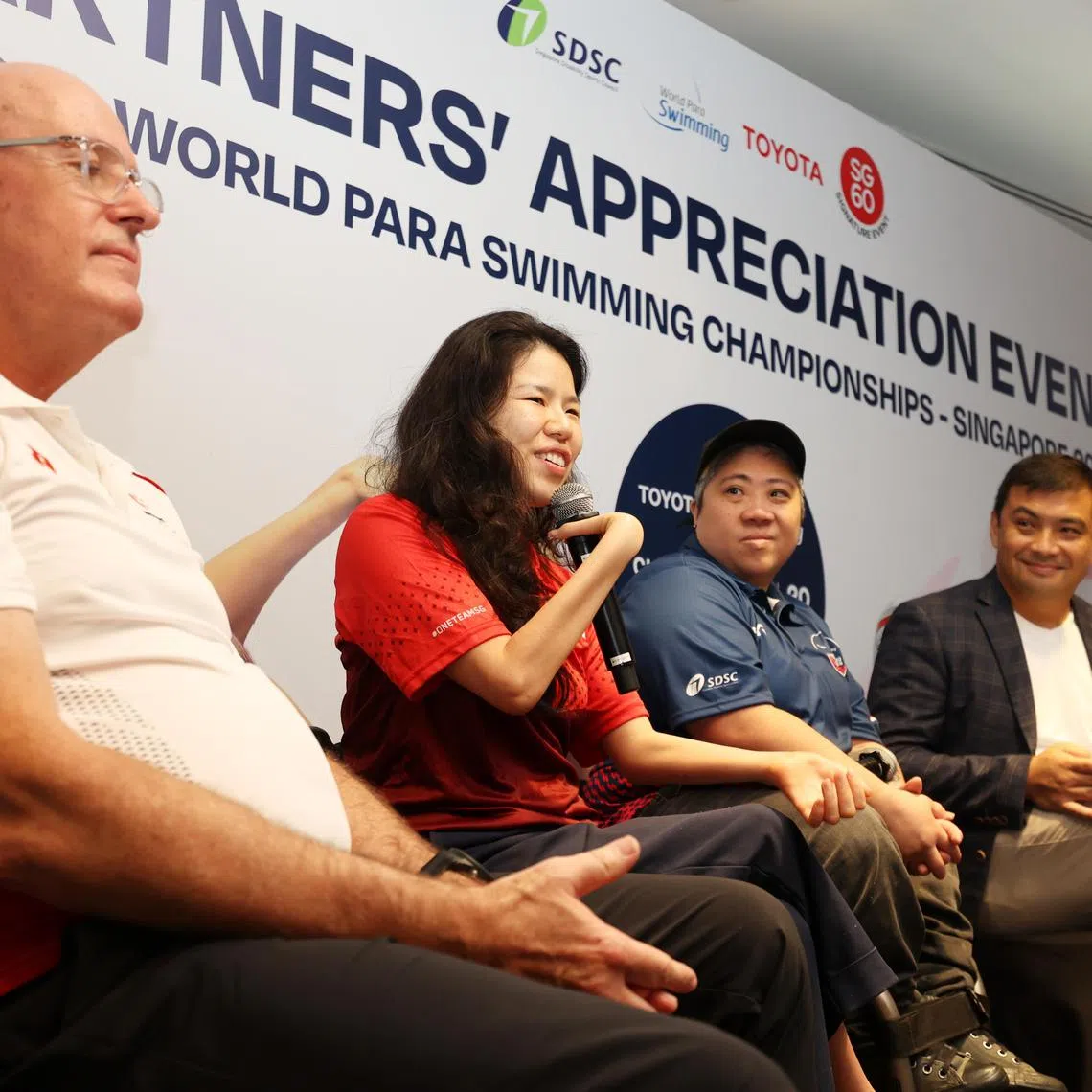 (From left) Para swimming coach Mick Massey, para-swimmer Yip Pin Xiu, former national para-swimmer Theresa Goh and former national water polo player Yip Ren Kai at the  World Para Swimming Championships' partners appreciation event.