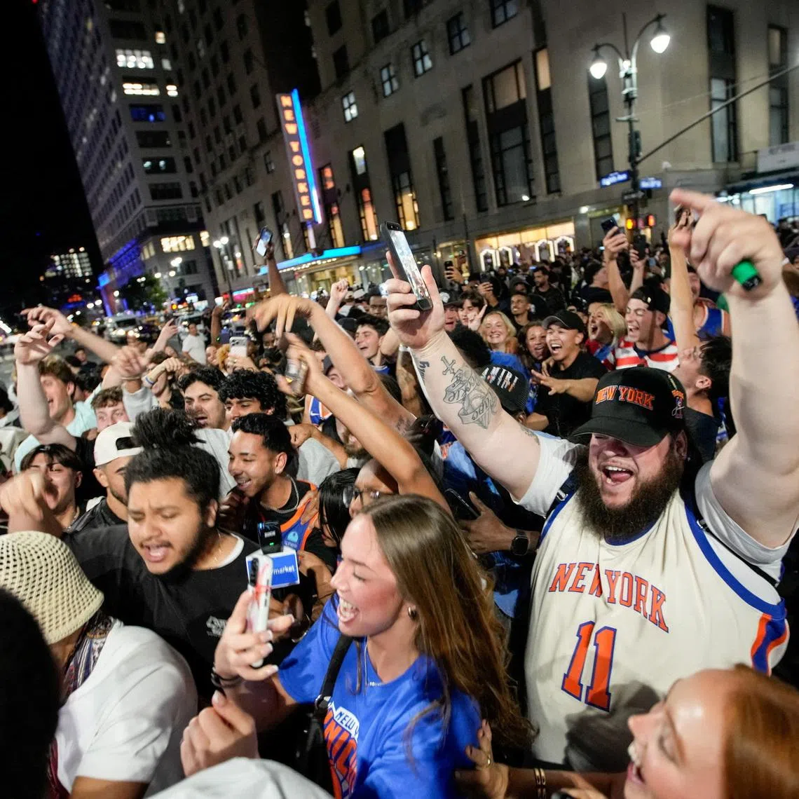 Fans block 8th Avenue near Madison Square Garden after the Game 3 of the NBA Finals between the New York Knicks and San Antonio Spurs in New York City, U.S., June 8, 2026. REUTERS/Eduardo Munoz