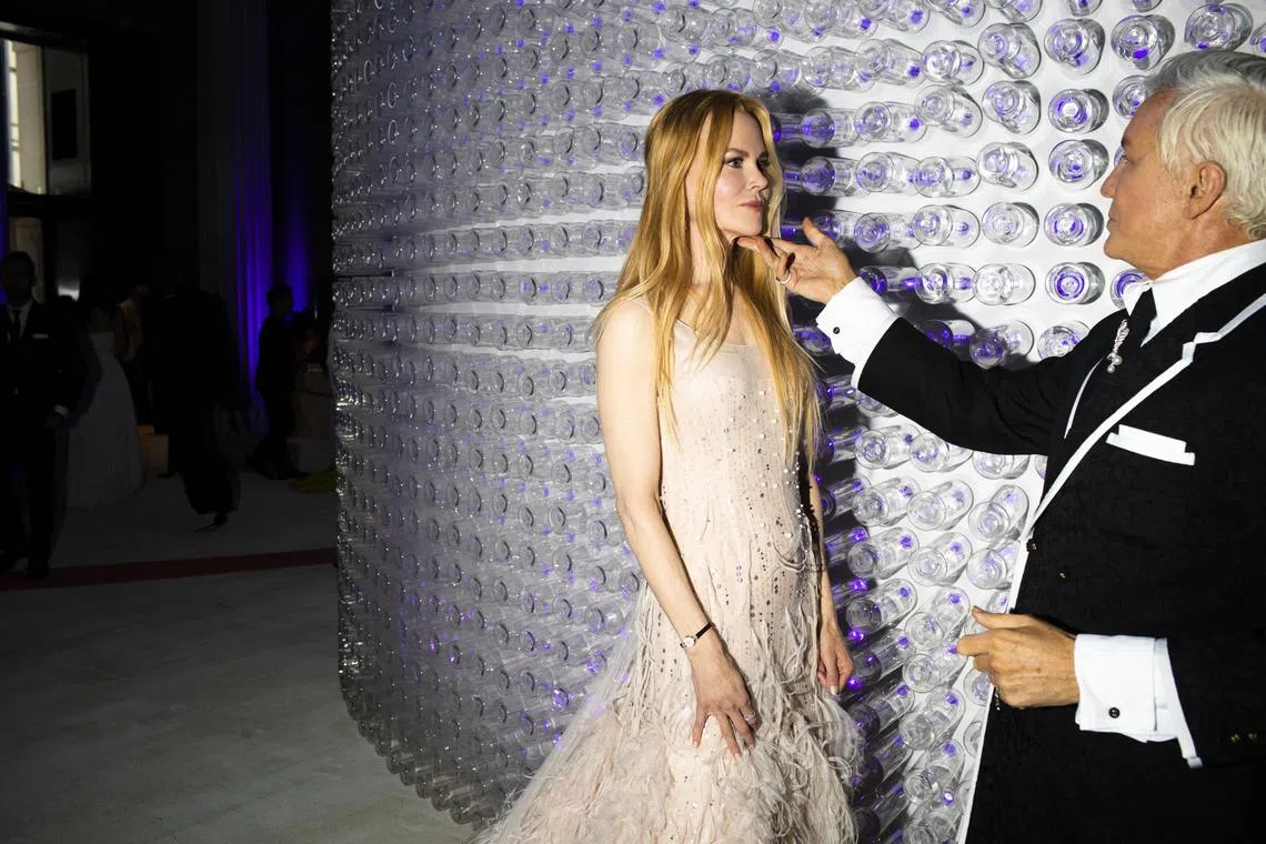 Nicole Kidman - wearing a vintage Omega Sapphette jewellery watch from 1955 - and Baz Luhrmann at the Metropolitan Museum of Art's Costume Institute benefit gala in New York.