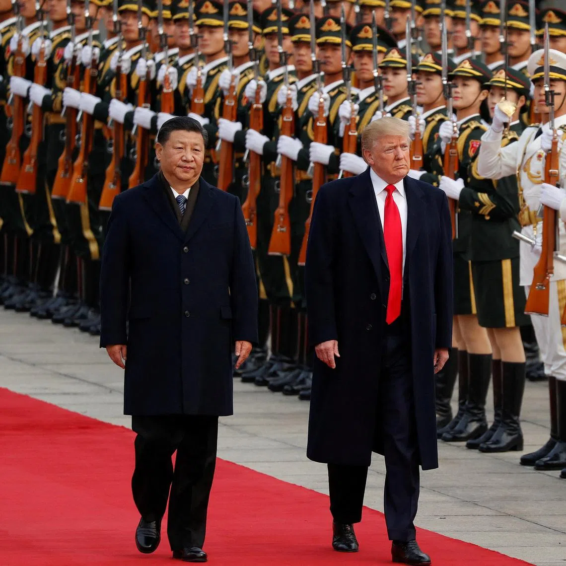 US President Donald Trump takes part in a welcoming ceremony with China's President Xi Jinping in Beijing, China, on Nov 9, 2017. 