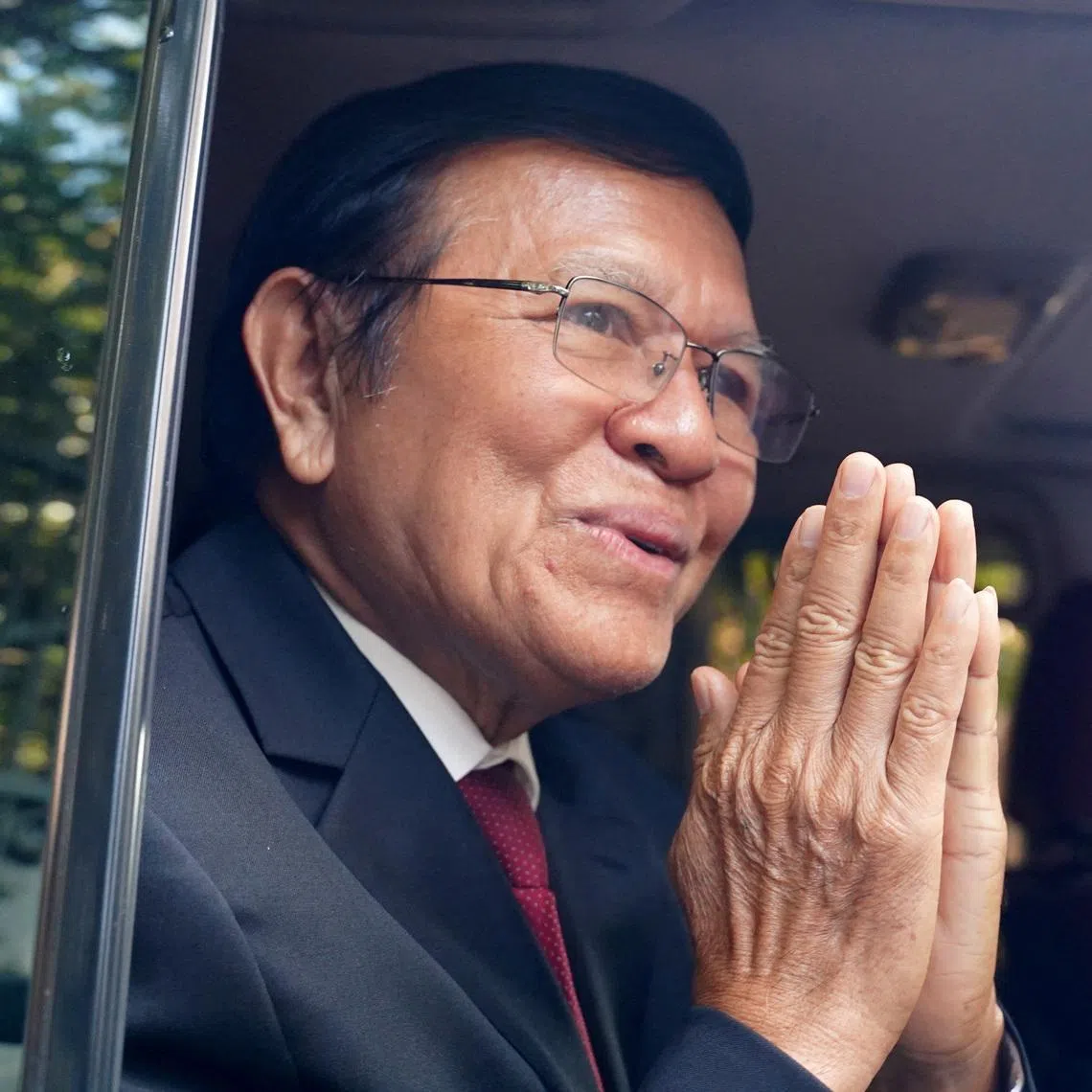 FILE PHOTO: Former Cambodia National Rescue Party (CNRP) leader Kem Sokha leaves his house for the Phnom Penh Municipal Court for the hearing of the verdict in his treason case where he was was sentenced to 27 years in detention under house arrest after being found guilty, in Phnom Penh, Cambodia, March 3, 2023. REUTERS/Cindy Liu/File Photo