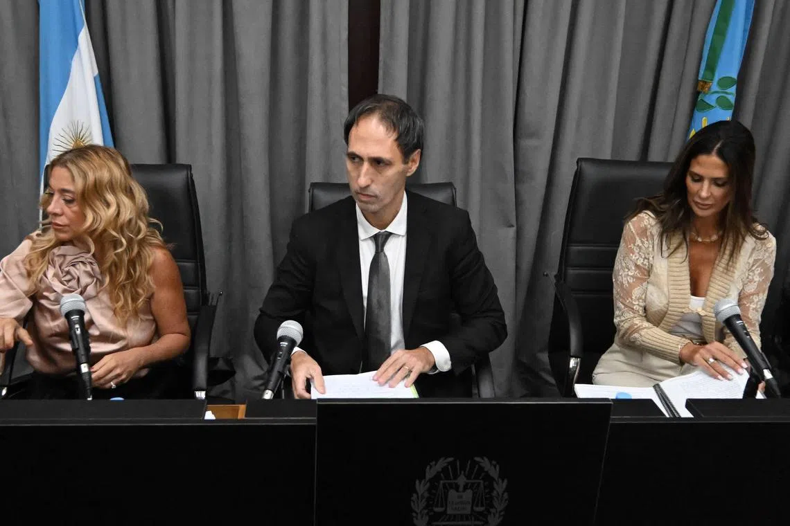 Judges Veronica Di Tommaso, Maximiliano Savarino and Julieta Makintach are seen during the trial for the death of late Argentine football legend Diego Maradona at the San Isidro court.